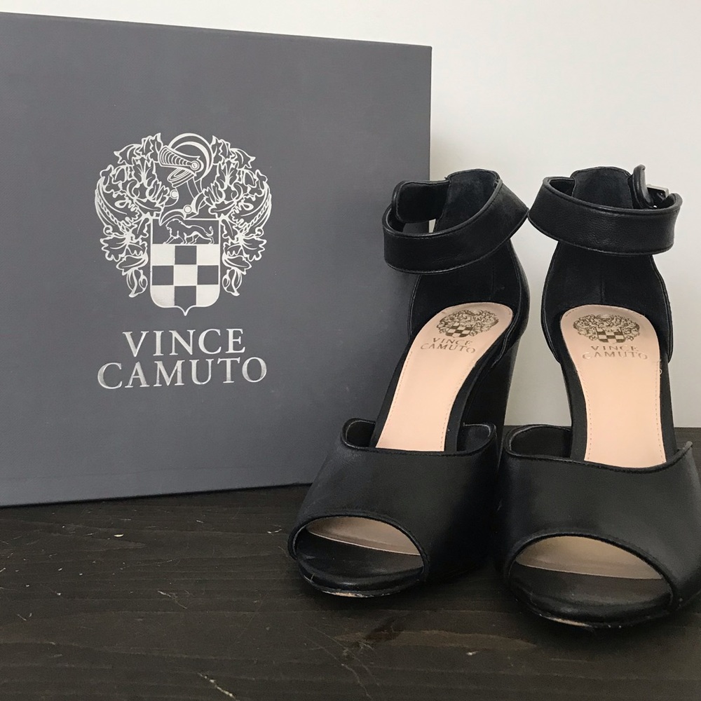 Vince Camuto black leather wedge shoes.